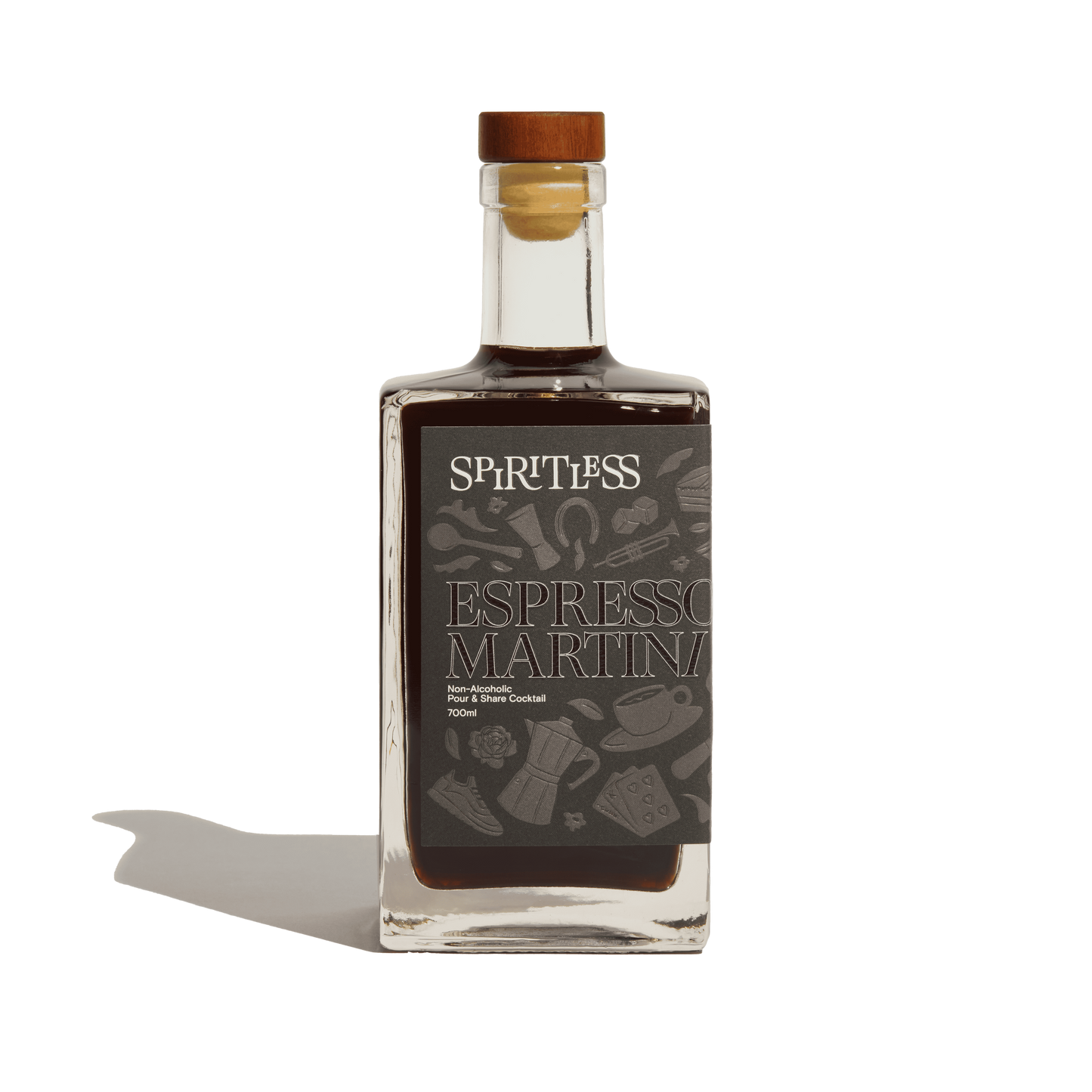 Bottle of Spiritless Espresso Martini on a green background